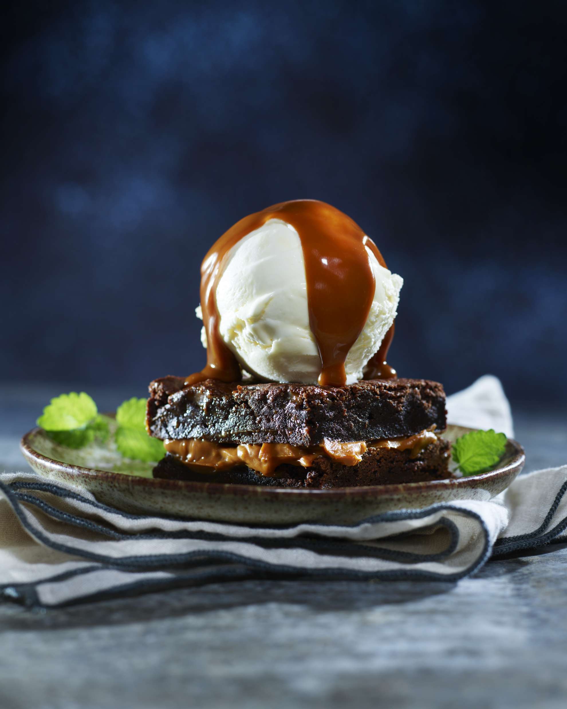 TINE® Brunost™ Sauce is the perfect topping for ice cream & brownies